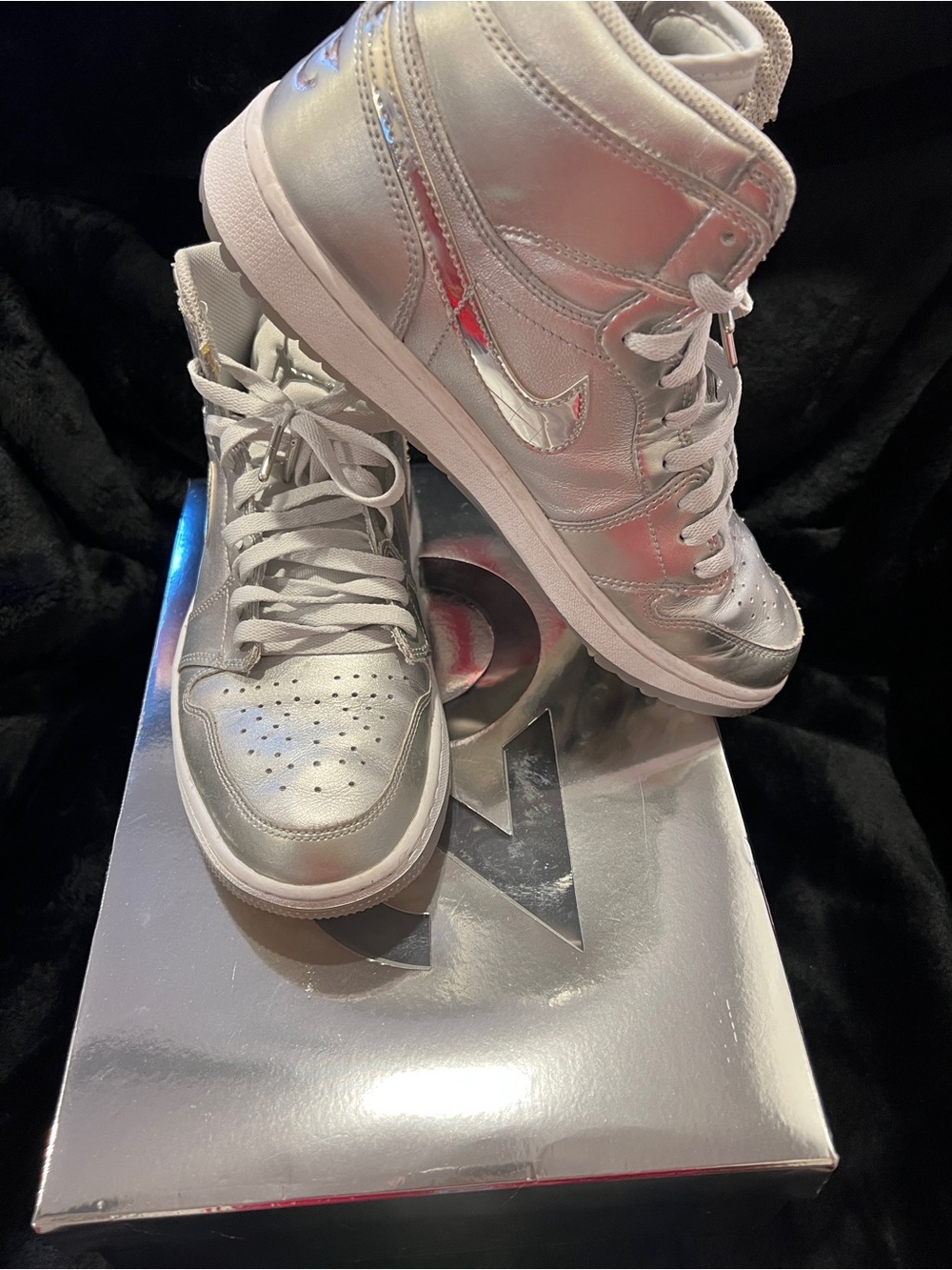 Nike Air Jordan Women’s Metallic Silver High-Top Sneakers